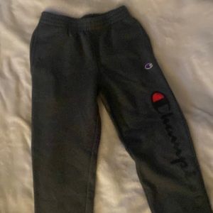 Champion sweatpants, size medium, dark grey, and cuffed ankles.